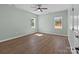 Bright bedroom features two large windows and hardwood floors creating a cozy and inviting atmosphere at 140 Swimmers Ln, Salisbury, NC 28146