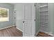 Cozy bedroom showcasing hardwood floors, built-in shelving and bright window for lots of natural light at 140 Swimmers Ln, Salisbury, NC 28146