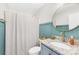 Stylish bathroom features modern fixtures, gold accents, and wainscoting at 1429 Scotts Creek Rd, Statesville, NC 28625