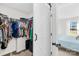 Walk-in closet with well-organized shelving and hanging space, providing ample storage at 1429 Scotts Creek Rd, Statesville, NC 28625