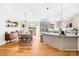 Full kitchen view, showing stainless appliances, dining area and access to the back deck at 1429 Scotts Creek Rd, Statesville, NC 28625