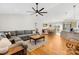 Open concept living area with hardwood floors connecting the living room, dining area and kitchen at 1429 Scotts Creek Rd, Statesville, NC 28625