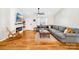 Living room with hardwood floors, modern fireplace, and a comfortable sectional sofa at 1429 Scotts Creek Rd, Statesville, NC 28625