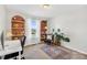 Inviting office space with built-in shelving and comfortable seating area at 1429 Scotts Creek Rd, Statesville, NC 28625