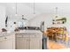 Spacious open-concept design integrating the kitchen, dining, and living areas under a vaulted ceiling at 1429 Scotts Creek Rd, Statesville, NC 28625