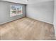 Comfortable bedroom with a large window offering a bright and airy atmosphere at 151 Slip Shot Ln, Troutman, NC 28166