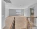 Large bonus room with lots of natural light, neutral carpet, and light gray walls at 151 Slip Shot Ln, Troutman, NC 28166