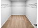 Spacious walk-in closet with wire shelving for optimal organization and storage solutions at 151 Slip Shot Ln, Troutman, NC 28166
