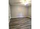 An expansive bedroom featuring durable flooring, neutral paint, and a modern ceiling fan at 1607 W Nc 27 Hwy, Lincolnton, NC 28092