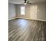 Bright bedroom with ample natural light and modern flooring, offering a peaceful retreat at 1607 W Nc 27 Hwy, Lincolnton, NC 28092