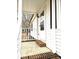 Cozy front porch with white railings, leading to the entrance of this lovely home at 1607 W Nc 27 Hwy, Lincolnton, NC 28092