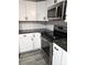 Modern kitchen appliances featuring stainless steel oven and microwave, adding a touch of elegance to the space at 1607 W Nc 27 Hwy, Lincolnton, NC 28092