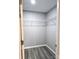 Organized walk-in closet with durable flooring and wire shelving for maximizing storage space at 1607 W Nc 27 Hwy, Lincolnton, NC 28092