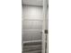 Walk-in closet with gray walls, durable flooring and wire shelving with clothing rack at 1607 W Nc 27 Hwy, Lincolnton, NC 28092