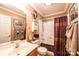 Updated bathroom featuring a single sink vanity, shower and decorative accents at 1636 Samaria Ln, Conover, NC 28613