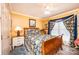 Comfortable secondary bedroom featuring hardwood floors and a ceiling fan at 1636 Samaria Ln, Conover, NC 28613
