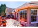 Spacious outdoor deck area with red painted floor overlooking the yard at 1636 Samaria Ln, Conover, NC 28613