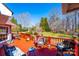 Spacious outdoor deck area with red painted floor and wooded views at 1636 Samaria Ln, Conover, NC 28613