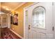 Elegant foyer featuring decorative glass door and hardwood floors at 1636 Samaria Ln, Conover, NC 28613