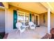 Inviting front porch with charming wicker seating and decorative shutters at 1636 Samaria Ln, Conover, NC 28613