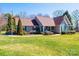 Attractive one-story home featuring a well-manicured lawn and established landscaping at 1636 Samaria Ln, Conover, NC 28613
