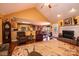 Open-concept living room with fireplace connecting to kitchen and dining at 1636 Samaria Ln, Conover, NC 28613
