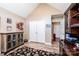 Neutral toned office space with wood floors, built in shelving, and natural light at 1636 Samaria Ln, Conover, NC 28613