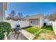 Private backyard with fence, patio, small lawn, and storage shed, ideal for outdoor enjoyment at 19009 Coachmans Trce, Cornelius, NC 28031