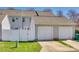 Attached two car garage with driveway and fenced in yard at 19009 Coachmans Trce, Cornelius, NC 28031