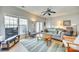 Spacious living room with neutral walls, tile flooring and furniture at 19009 Coachmans Trce, Cornelius, NC 28031