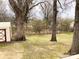 The property boasts a spacious backyard with mature trees at 211 W 1St St, Landis, NC 28088
