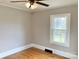 Bedroom featuring hardwood floors, light gray walls, and a window at 211 W 1St St, Landis, NC 28088