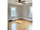 Bedroom showcasing hardwood floors and natural light streaming through the windows at 211 W 1St St, Landis, NC 28088