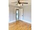 Bedroom with hardwood floors and an open doorway at 211 W 1St St, Landis, NC 28088
