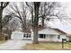 Charming home featuring a well-maintained yard and an attached garage at 211 W 1St St, Landis, NC 28088