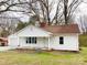 Well-maintained single-story home with a detached garage, offering curb appeal and convenience at 211 W 1St St, Landis, NC 28088