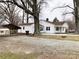 Charming home featuring a well-maintained yard and a side carport at 211 W 1St St, Landis, NC 28088