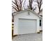 Detached one car garage with white door, perfect for parking and extra storage space at 211 W 1St St, Landis, NC 28088