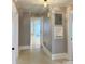 Inviting hallway with neutral tones and a view into other rooms of the home at 211 W 1St St, Landis, NC 28088