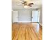 The living room features hardwood floors, neutral walls, and lots of natural light at 211 W 1St St, Landis, NC 28088