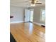Inviting living room with hardwood floors, fireplace, and a view to the outdoors at 211 W 1St St, Landis, NC 28088