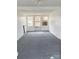 Bright sunroom with neutral carpet and plenty of natural light at 211 W 1St St, Landis, NC 28088