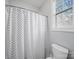 Bathroom features a walk-in shower and window at 3024 Beaver Dam Dr, Monroe, NC 28110