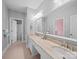 Bathroom features double sinks and a large mirror at 3024 Beaver Dam Dr, Monroe, NC 28110