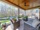Covered patio with an outdoor ceiling fan and patio furniture, perfect for entertaining at 3024 Beaver Dam Dr, Monroe, NC 28110