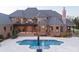 Luxury home features a brick exterior, an inground pool, and a spacious backyard at 3200 Beaty Rd, Gastonia, NC 28056