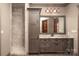 Bathroom with a walk-in shower, granite countertops, storage, and a large mirror for a spa-like feel at 3200 Beaty Rd, Gastonia, NC 28056