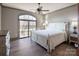 Bright bedroom with hardwood floors, an oversized window, and a dresser for ample storage at 3200 Beaty Rd, Gastonia, NC 28056