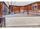Spacious garage with high ceilings, wood panel walls, and ample room for vehicle storage and projects at 3200 Beaty Rd, Gastonia, NC 28056