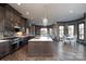 Open kitchen with stainless steel appliances, marble countertops, and a connected dining area at 3200 Beaty Rd, Gastonia, NC 28056